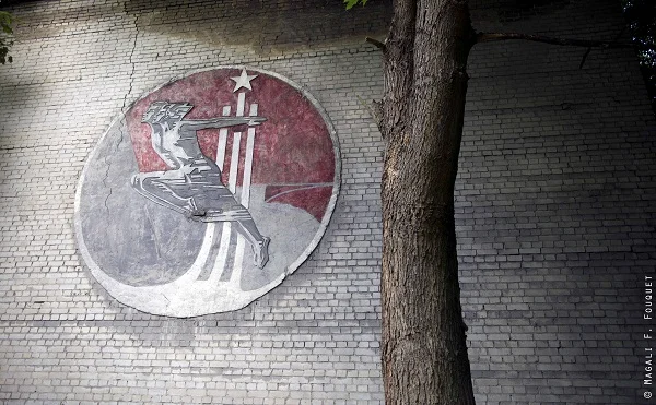 -®medaille sur mur